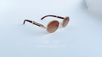 Ochelari de soare Cartier Giverny Style cu rame aurii și maro și lentile degrade maro, eleganți pentru bărbați.