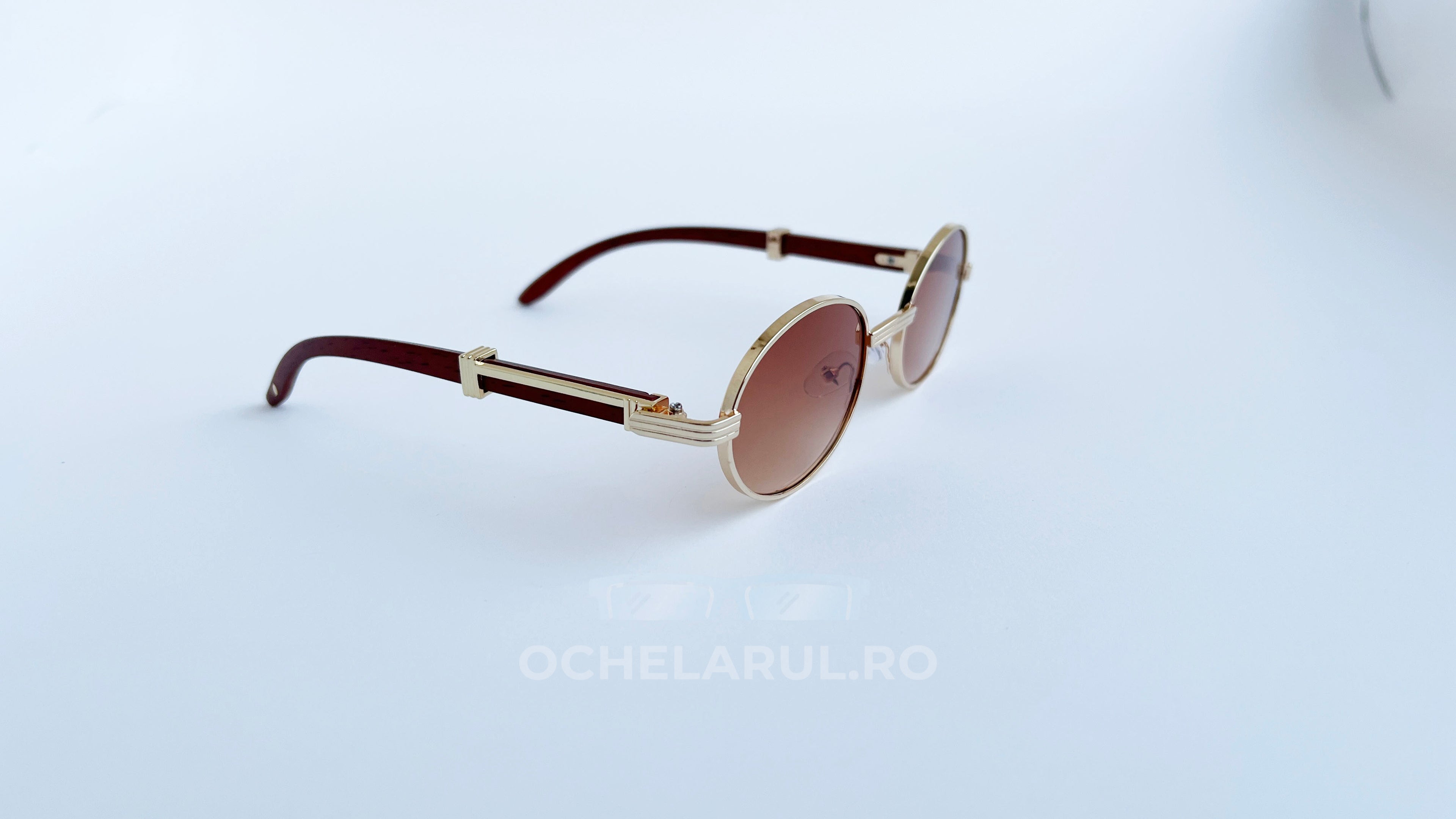 Ochelari de soare Cartier Giverny Style cu rame aurii și maro și lentile maro degrade, stil elegant.