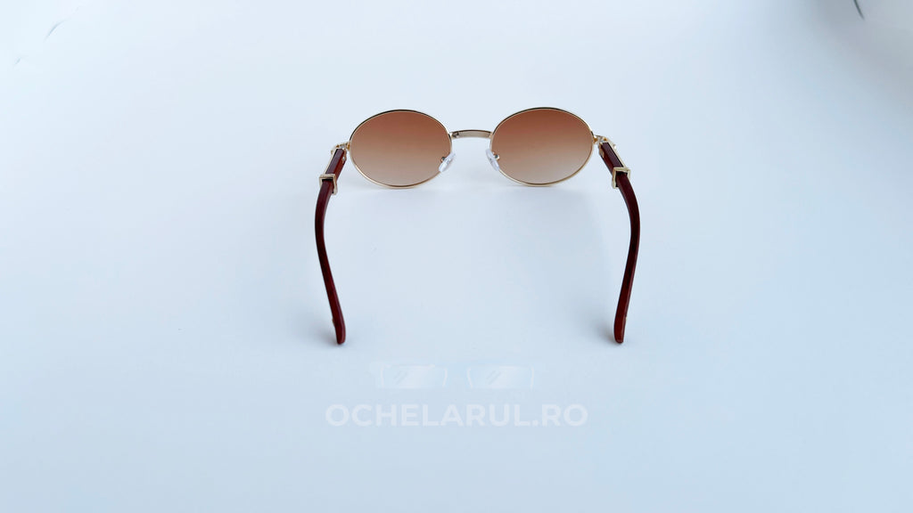 Ochelari de soare Cartier Giverny Style cu rame aurii și lentile maro degrade, design elegant pentru bărbați.