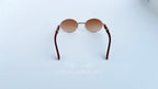 Ochelari de soare Cartier Giverny Style cu rame aurii și lentile maro degrade, design elegant pentru bărbați.