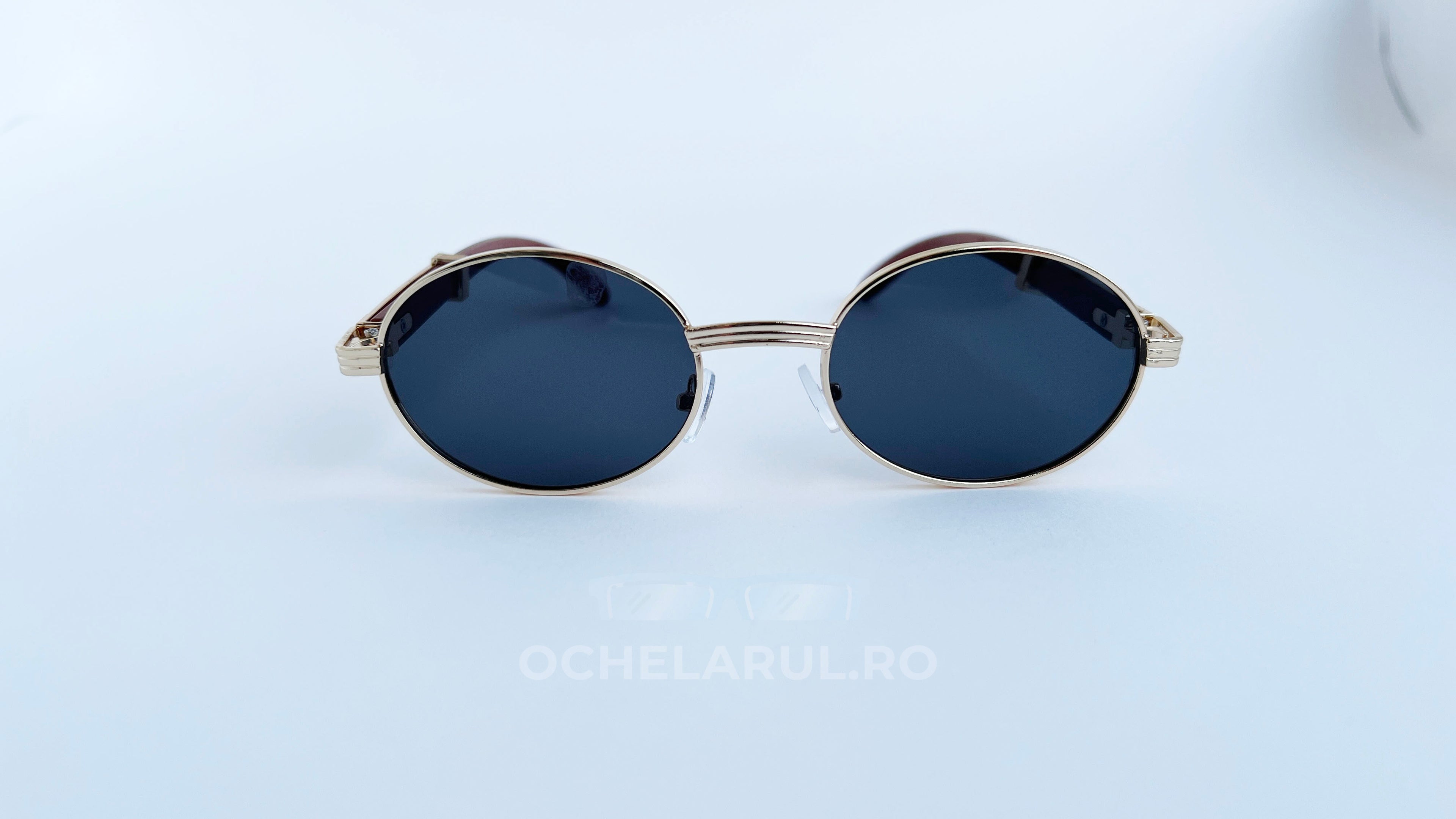 Ochelari de soare Cartier Giverny Style cu rame aurii și lentile negre, design oval elegant pentru bărbați.