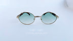 Ochelari de soare Cartier Giverny Style cu rame aurii și lentile verzi degrade, design elegant și modern.
