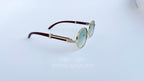 Ochelari de soare Cartier Giverny Style cu rame aurii și maro și lentile verzi degrade, stil elegant.