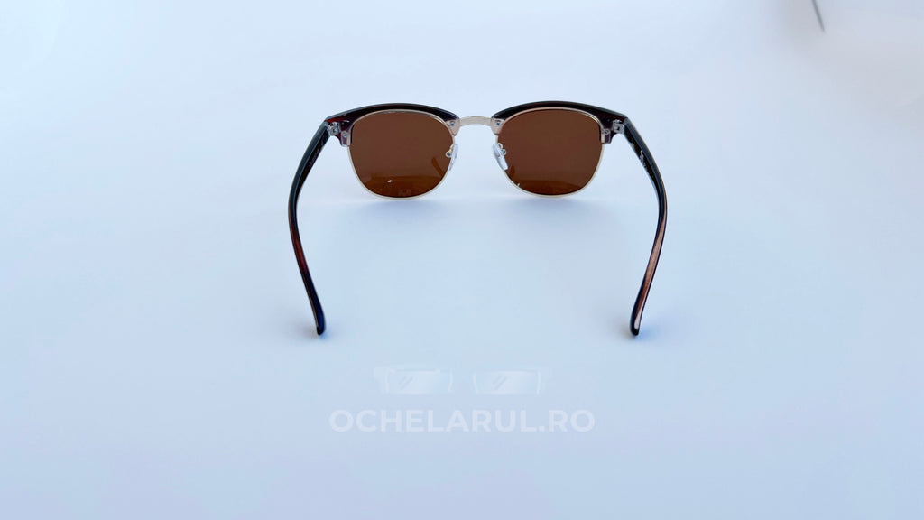 Ochelari de soare Clubmaster Polarizați cu rame maro și lentile brun închise, model clasic elegant.