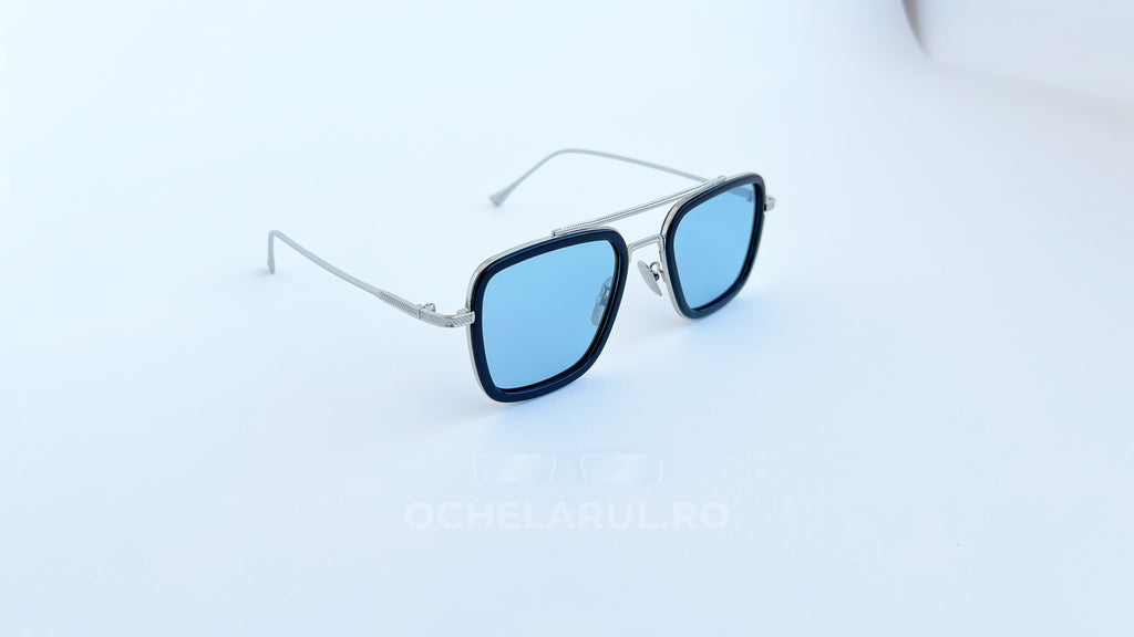 Ochelari de soare Dita Flight Style - Polarizați Fotocromatici cu lentile albastre și ramă argintie subțire, design modern.