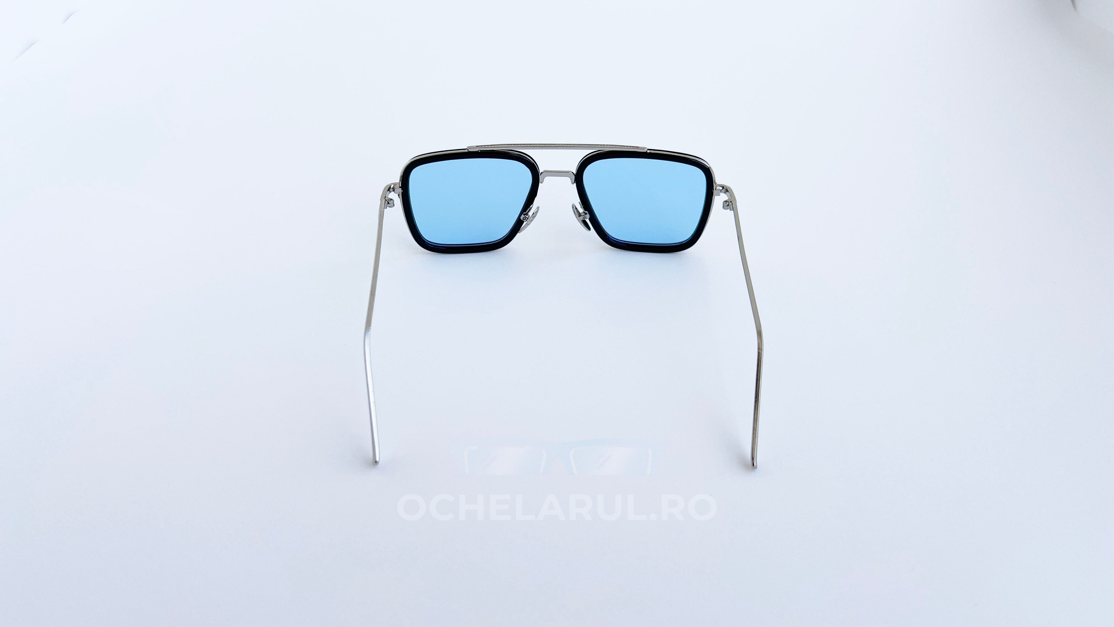 Ochelari de soare Dita Flight, rama argintie-neagra si lentile albastre degrade, vedere spate