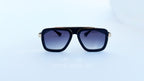 Ochelari de soare Dita LXN-EVO Style, rame negre cu accente aurii și protecție UV400.