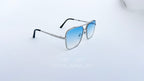Ochelari de soare Dita Mach Six Style cu rame argintii și lentile albastre degrade, design modern pentru bărbați.
