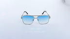 Ochelari de soare Dita Mach Six Style cu rame argintii și lentile albastre degrade, design masculin elegant.