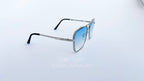 Ochelari de soare Dita Mach Six Style cu rame argintii și lentile albastre degrade, design modern pentru bărbați.
