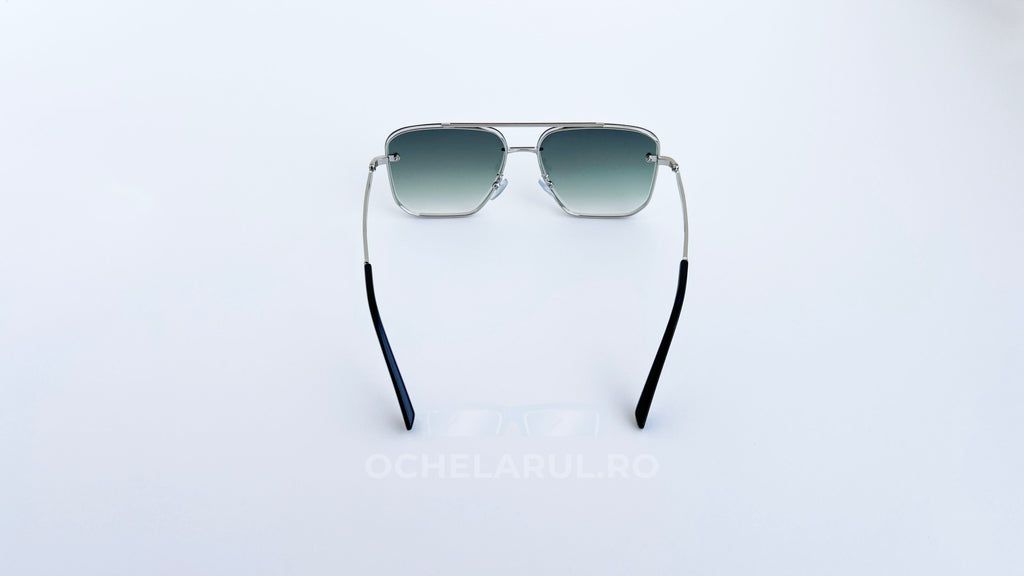 Ochelari de soare Dita Mach Six Style cu rame argintii și lentile degrade verzi, design modern pentru bărbați.