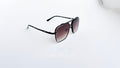 Ochelari de soare Dita Mach Six Style cu rame negre și lentile maro degrade, design masculin și elegant.