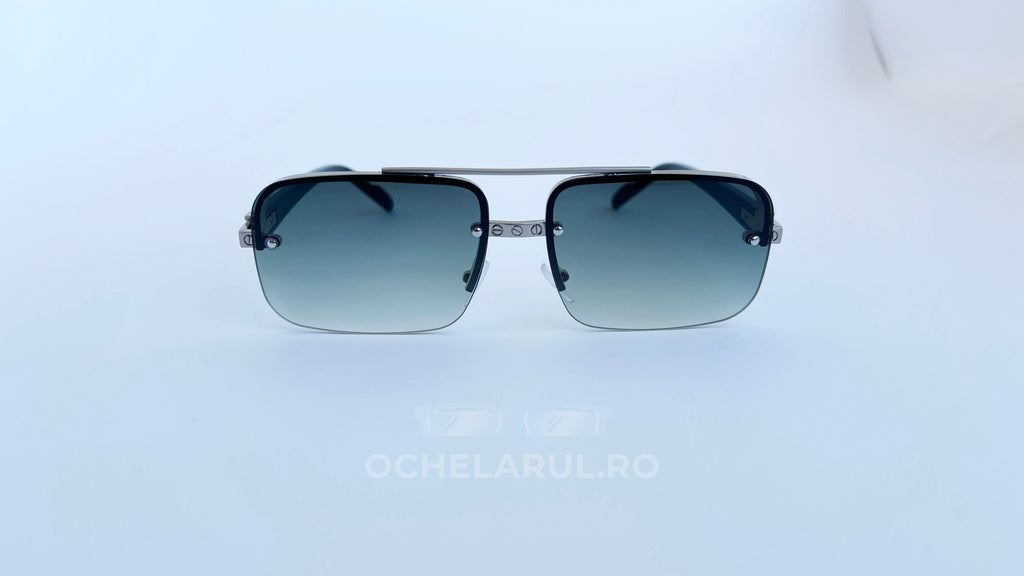 Ochelari de soare Dreptunghiulari cu rame metalice argintii și lentile verzi degrade, stil modern.