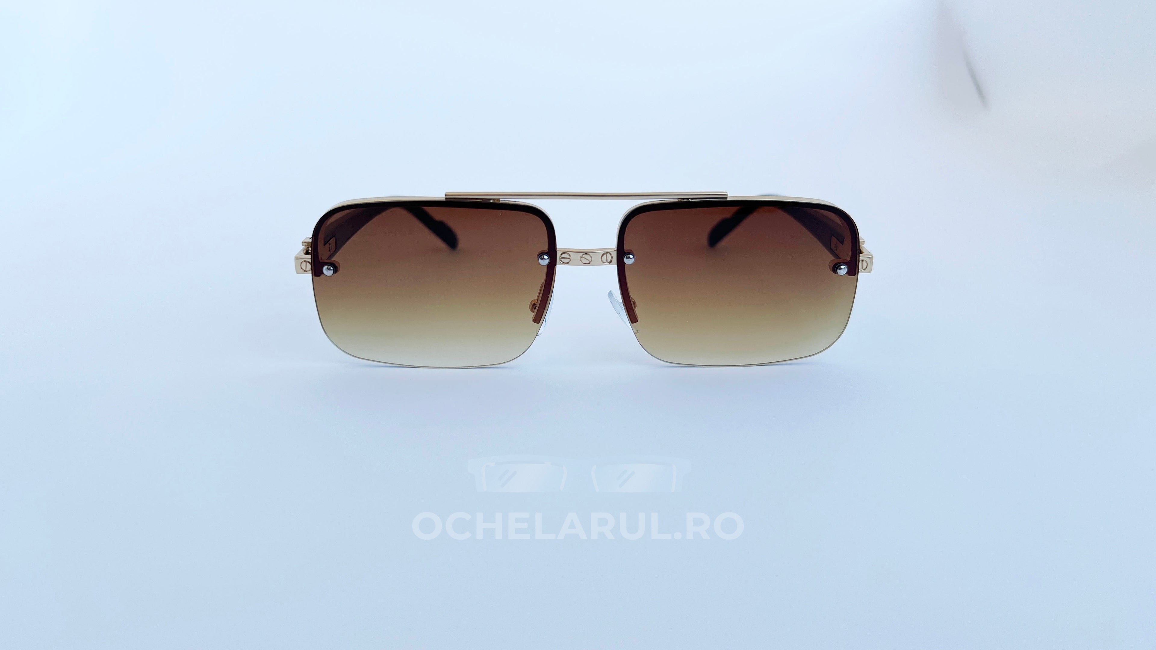 Ochelari de soare Dreptunghiulari cu rame aurii și lentile maro degrade, stil modern pentru bărbați.