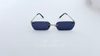 Ochelari de soare Dreptunghiulari Rimless cu lentile negre și rame subțiri argintii, model modern și minimalist.