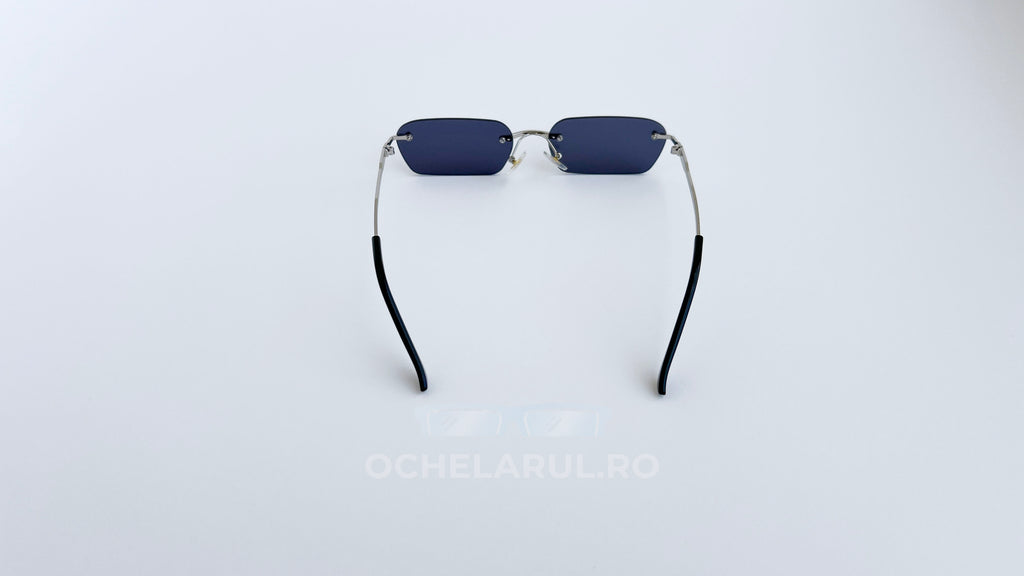 Ochelari de soare Dreptunghiulari Rimless cu lentile negre și brate argintii subțiri, design modern pentru bărbați.