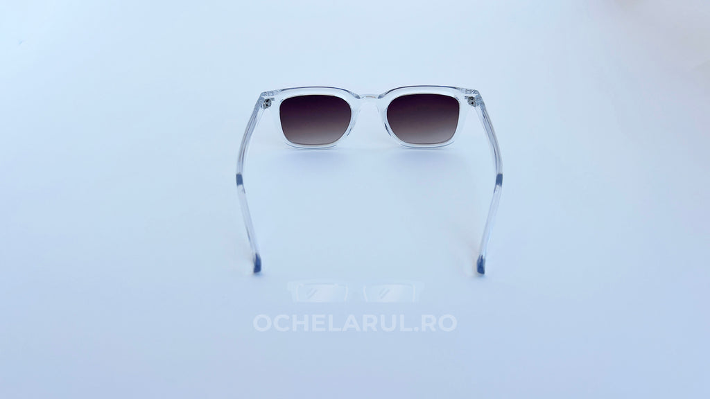 Ochelari de soare Moscot Klutz Style cu rame transparente și lentile maro degrade, design pentru bărbați.