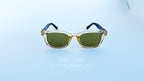 Ochelari de soare Moscot Klutz Style cu rame bej transparente și brațe în culoarea tortoise, lentile verzi, design unisex potrivit pentru ochelari de soare bărbați.