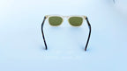 Ochelari de soare Moscot Klutz Style cu rame transparente bej și brațe în nuanțe de tortoise, lentile verzi, model unisex pentru protecție solară și stil modern.
