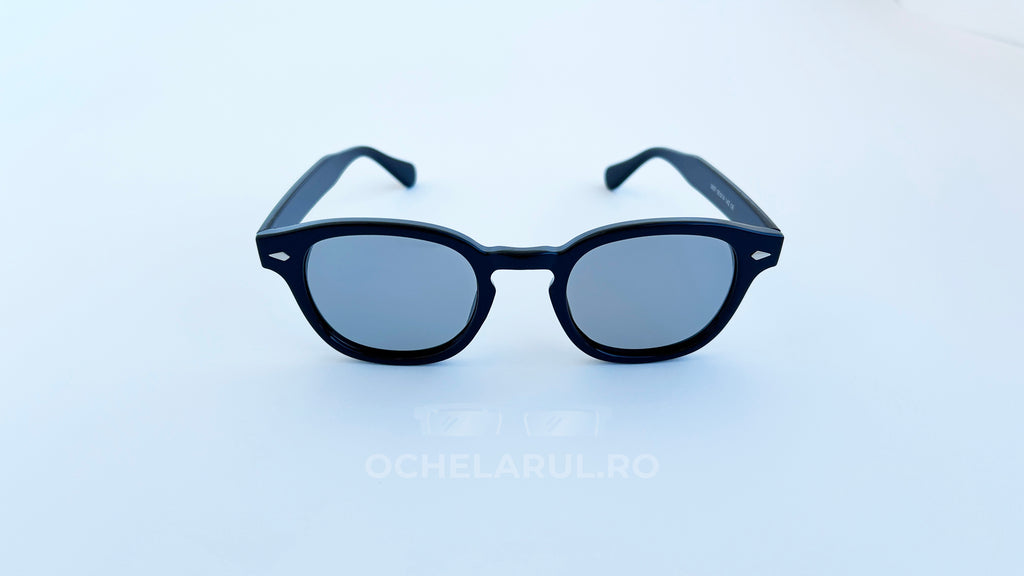 Ochelari Moscot Lemtosh Style - Polarizați Fotocromatici cu ramă neagră și lentile gri polarizate pentru protecție optimă.