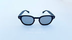 Ochelari Moscot Lemtosh Style - Polarizați Fotocromatici cu ramă neagră și lentile gri polarizate pentru protecție optimă.
