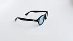 Ochelari de soare Moscot Lemtosh Style cu rame negre groase și lentile albastre, design unisex.