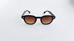 Ochelari de soare Moscot Lemtosh Style cu rame negre și lentile maro degrade, într-un design clasic pentru bărbați.