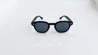 Ochelari de soare Moscot Lemtosh Style cu rame negre mate și lentile întunecate, design clasic pentru bărbați.