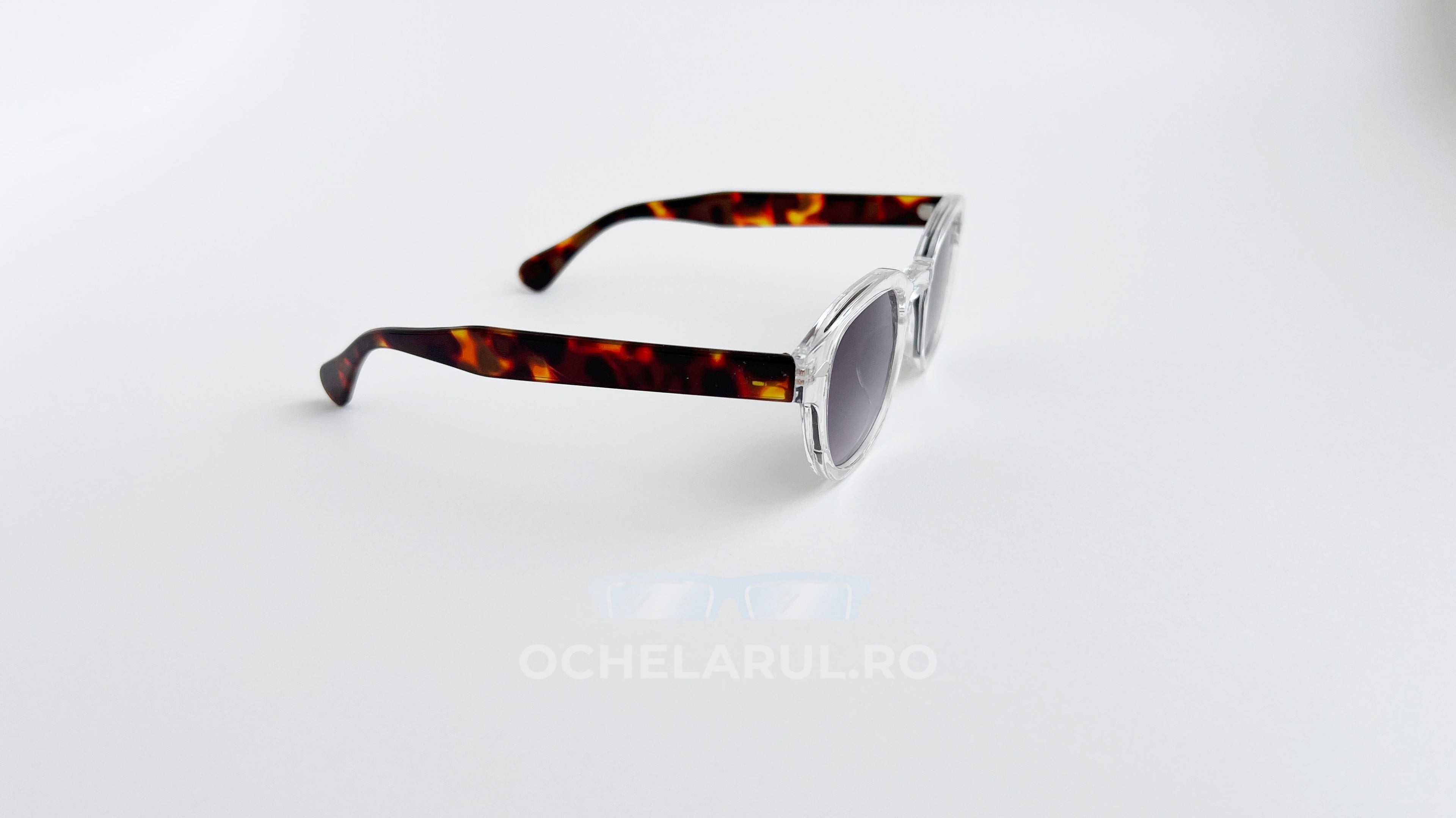 Ochelari de soare Moscot Lemtosh Style cu rame transparente și brațe Havana și lentile gri degrade, design unisex.