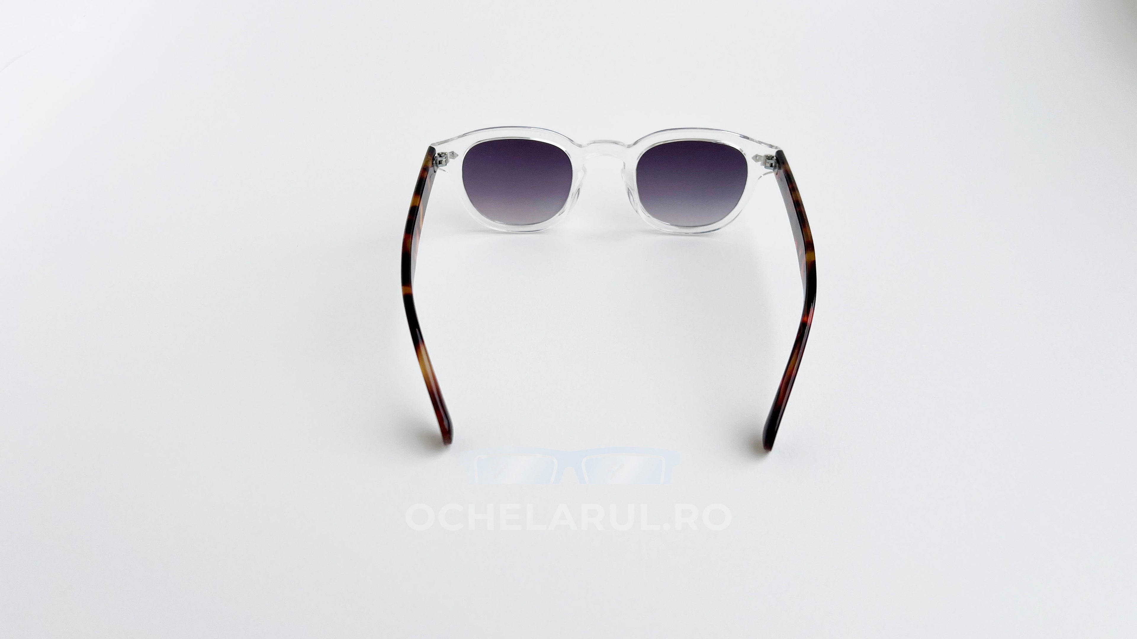 Ochelari de soare Moscot Lemtosh Style cu ramă transparentă, brațe Havana și lentile gri degrade, stil unisex.