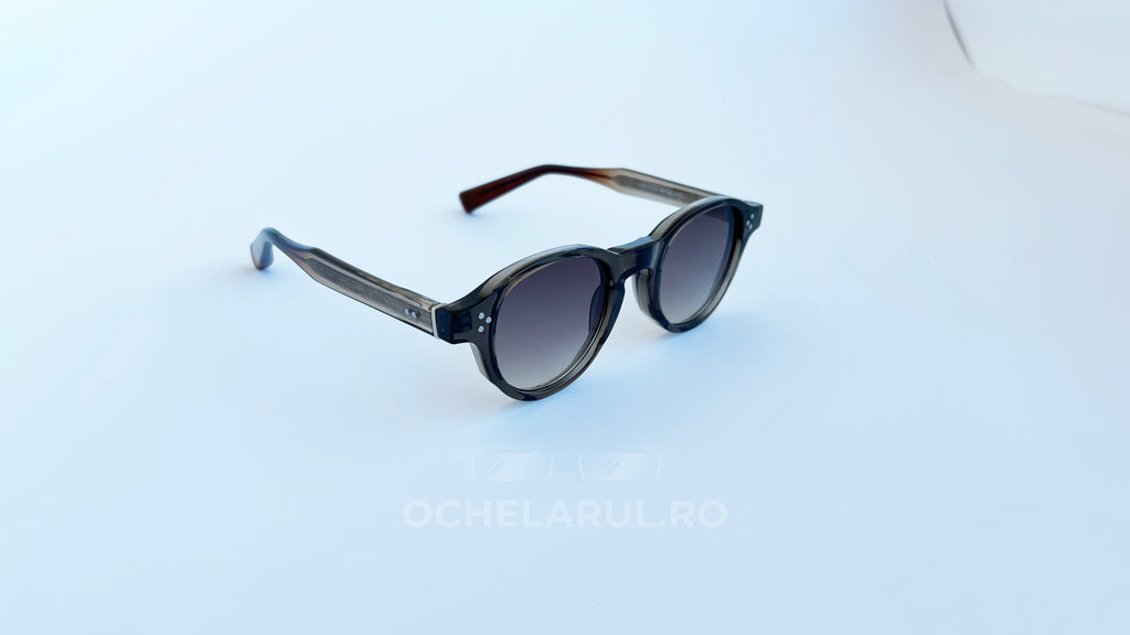 Ochelari de soare Moscot Style cu rame negre translucide și lentile în degrade pentru bărbați, model elegant și modern.