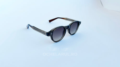 Ochelari de soare Moscot Style cu rame negre translucide și lentile în degrade pentru bărbați, model elegant și modern.