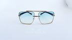 Ochelari de soare Patrati Design Vintage cu rama aurie maro și lentile albastre degrade, model elegant unisex.