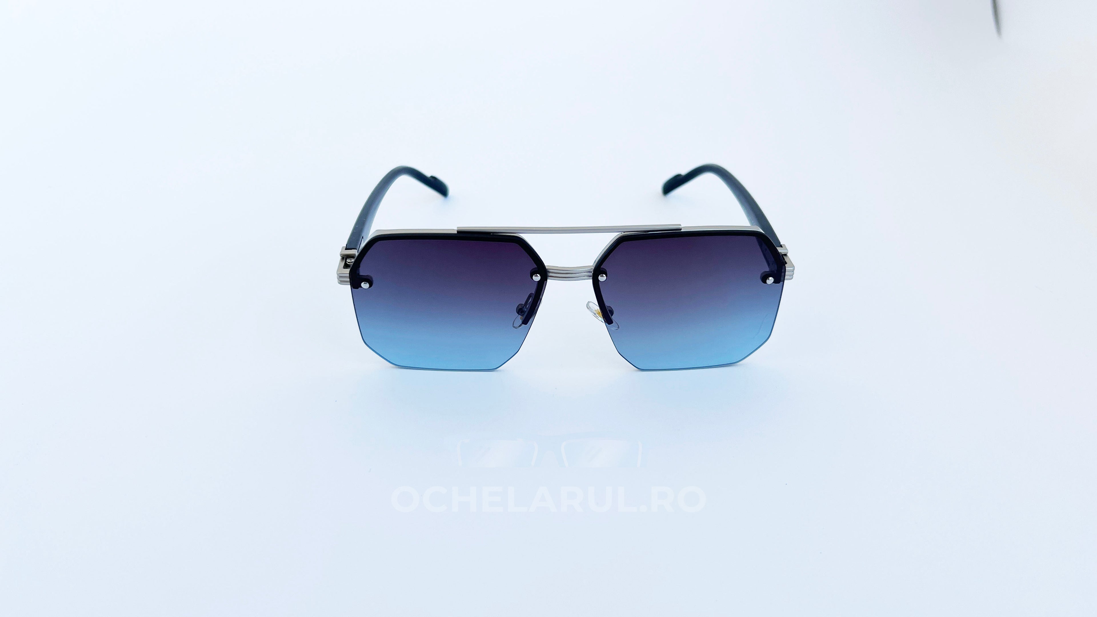 Ochelari de soare rectangulari semi-rim, rama argintie si lentile violet degrade, vedere fata