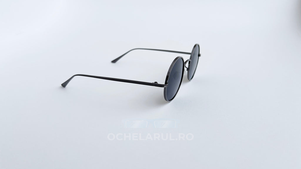 Ochelari de soare Rotunzi Polarizați cu rame subțiri negre și lentile întunecate elegante pentru bărbați.