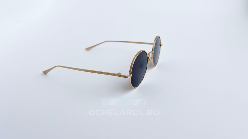 Ochelari de soare Rotunzi cu rame aurii subtiri si lentile negre, model elegant de ochelari de soare barbati