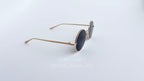 Ochelari de soare Rotunzi cu rame aurii subtiri si lentile negre, model elegant de ochelari de soare barbati