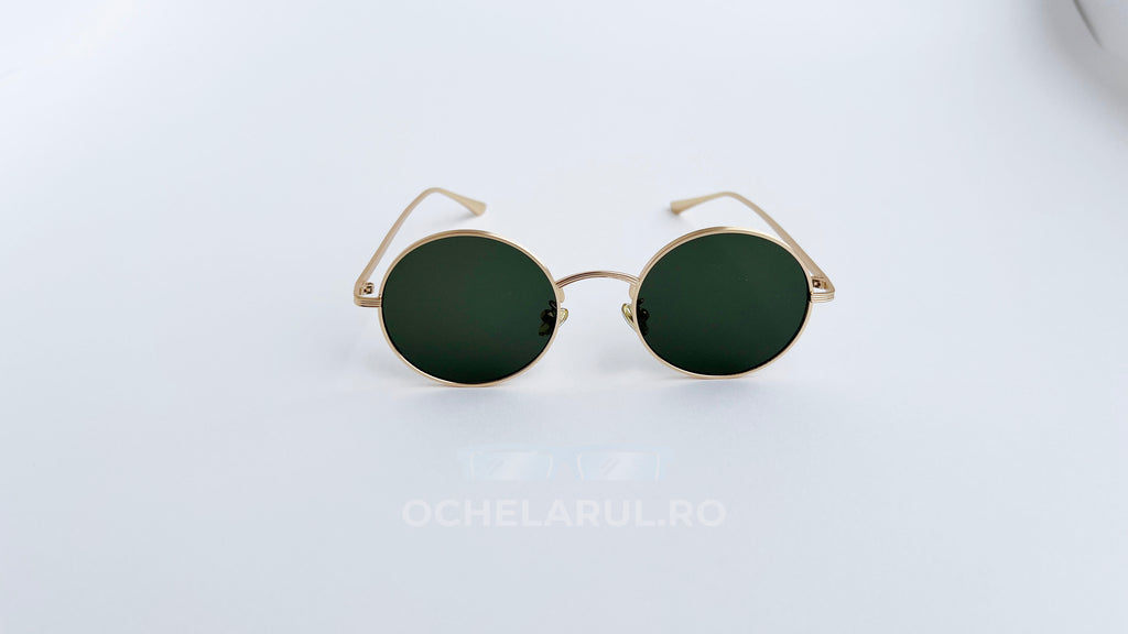 Ochelari de soare Rotunzi cu rame aurii și lentile verzi, eleganți și moderni pentru protecție solară.