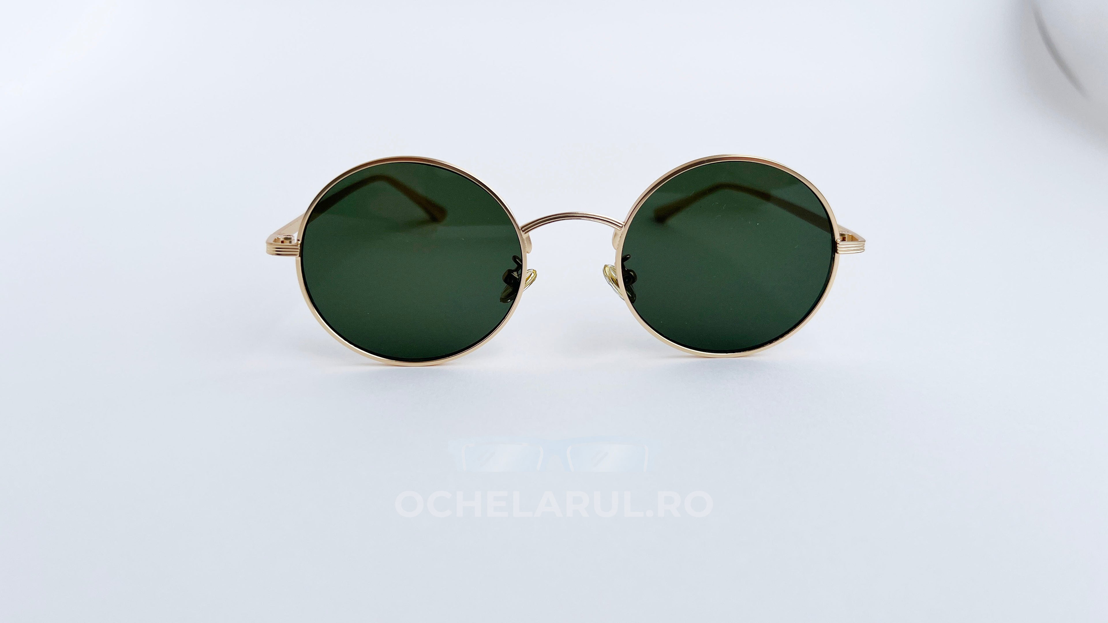 Ochelari de soare Rotunzi cu rame aurii și lentile verzi, design clasic pentru bărbați, stil elegant.