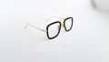 Ochelari Dita Flight Style cu rame aurii și negre, design modern pentru bărbați, lentile transparente.