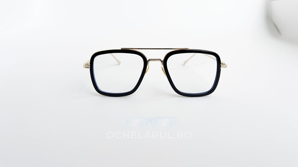 Ochelari Dita Flight Style cu rame aurii și negre și lentile transparente, design modern pentru bărbați.