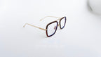 Ochelari Dita Flight Style cu rame maro aurii și lentile transparente, design elegant pentru ochelari de soare bărbați.