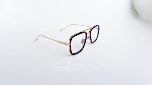 Ochelari Dita Flight Style cu rame maro aurii și lentile transparente, design elegant pentru ochelari de soare bărbați.