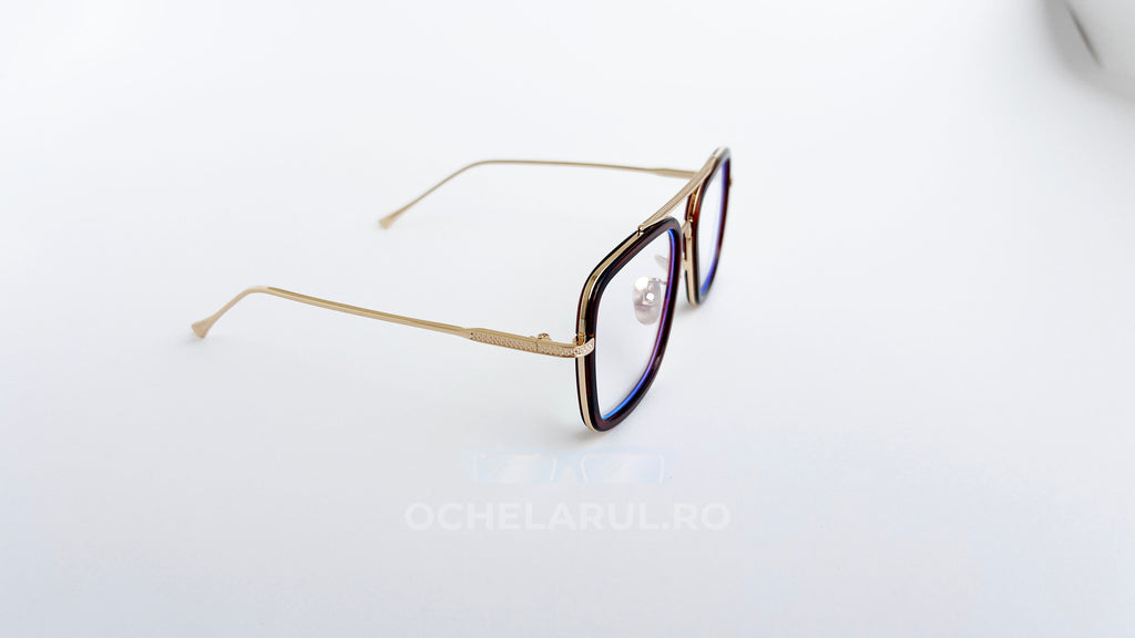 Ochelari Dita Flight Style cu rame aurii și maronii, lentile transparente, design modern și elegant pentru bărbați.