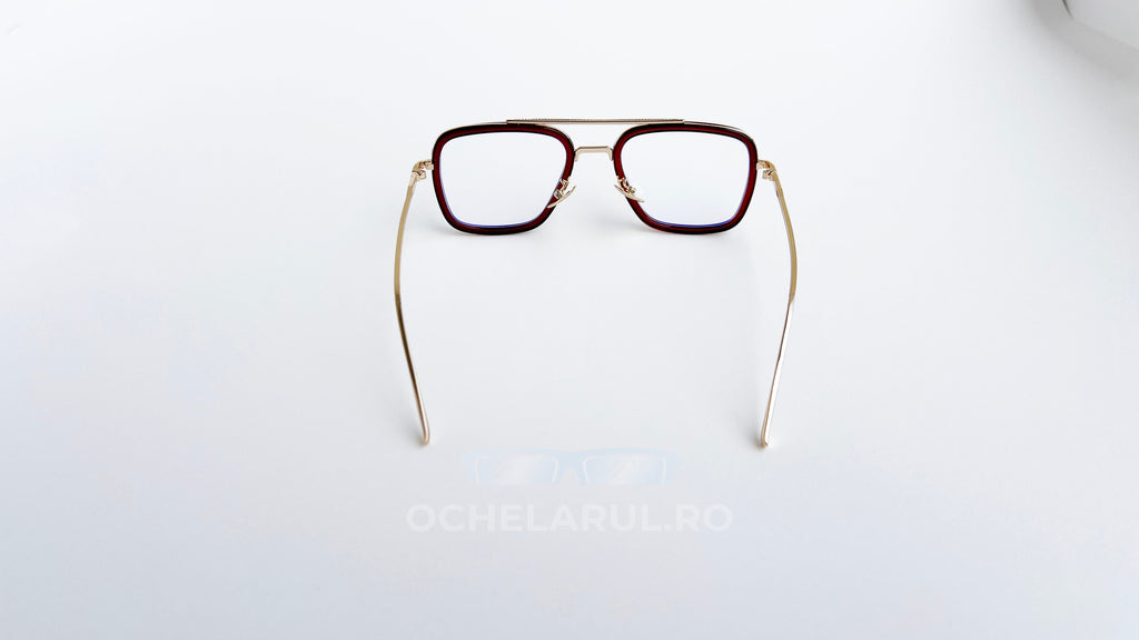 Ochelari Dita Flight Style cu rame maro aurii și lentile transparente, design elegant pentru bărbați.