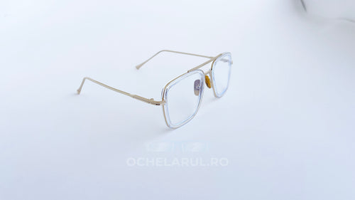 Ochelari Dita Flight Style cu rame aurii subțiri și lentile transparente, design modern și elegant.
