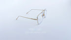 Ochelari Dita Flight Style cu rame aurii subțiri și lentile transparente, design elegant pentru bărbați.