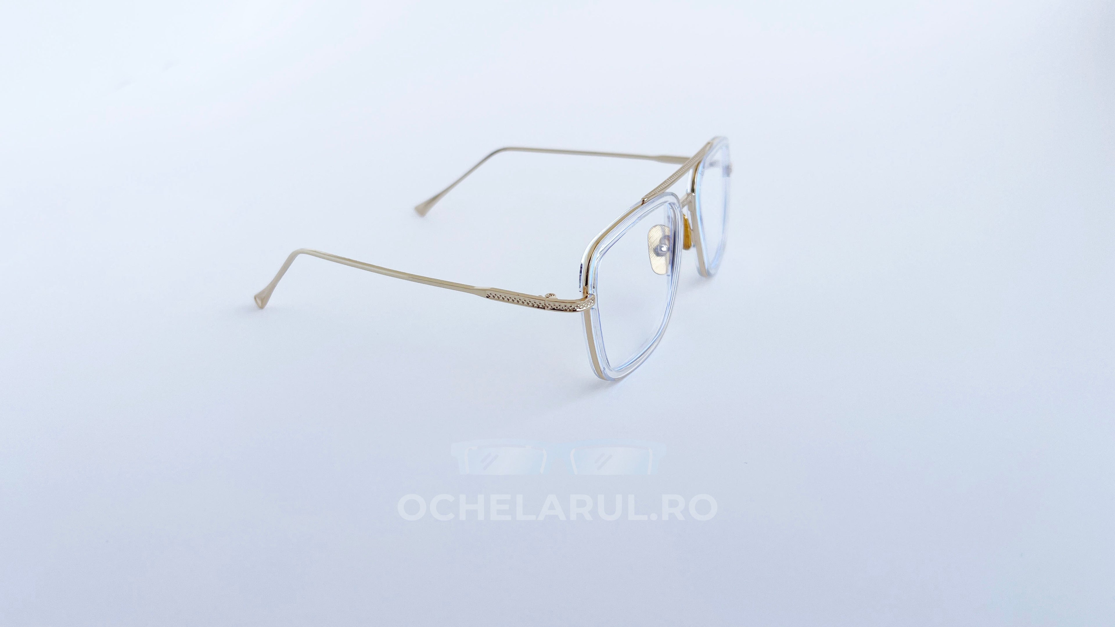 Ochelari Dita Flight Style cu rame aurii subțiri și lentile transparente, design elegant pentru bărbați.