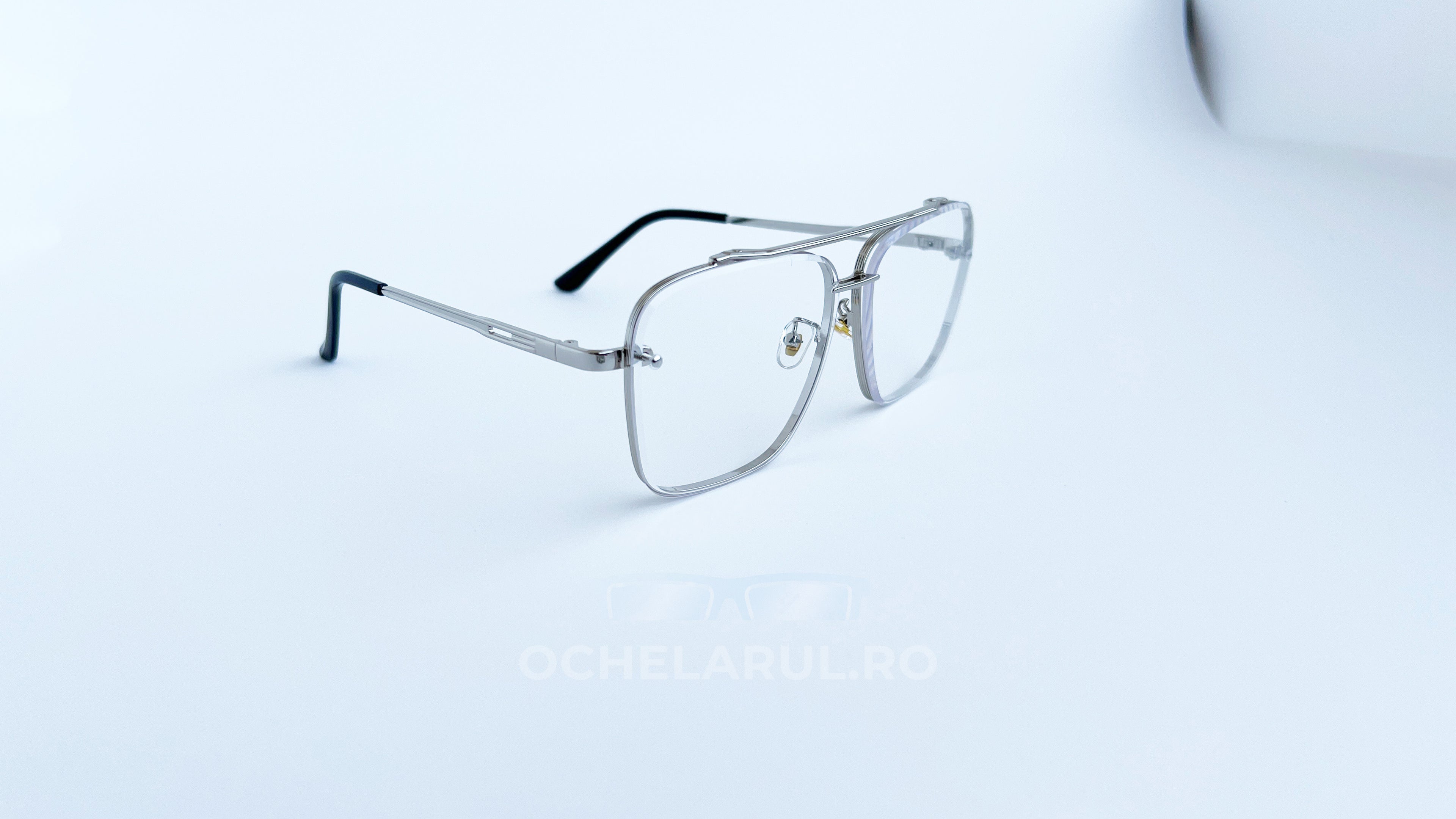 Ochelari Dita Mach Six Style, cu rame argintii și lentile transparente UV400.