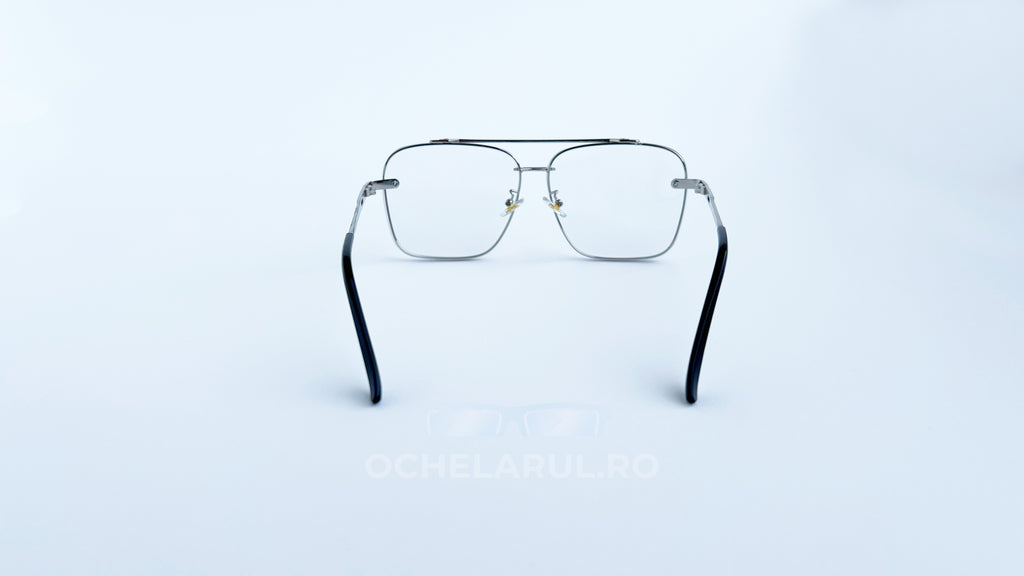 Ochelari Dita Mach Six Style argintii cu brațe negre, UV400, pe fundal alb, OCHELARUL.RO vizibil.